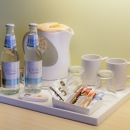 We offer a welcome water and an option to make tea or coffee.